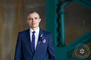 groom in a blue suit